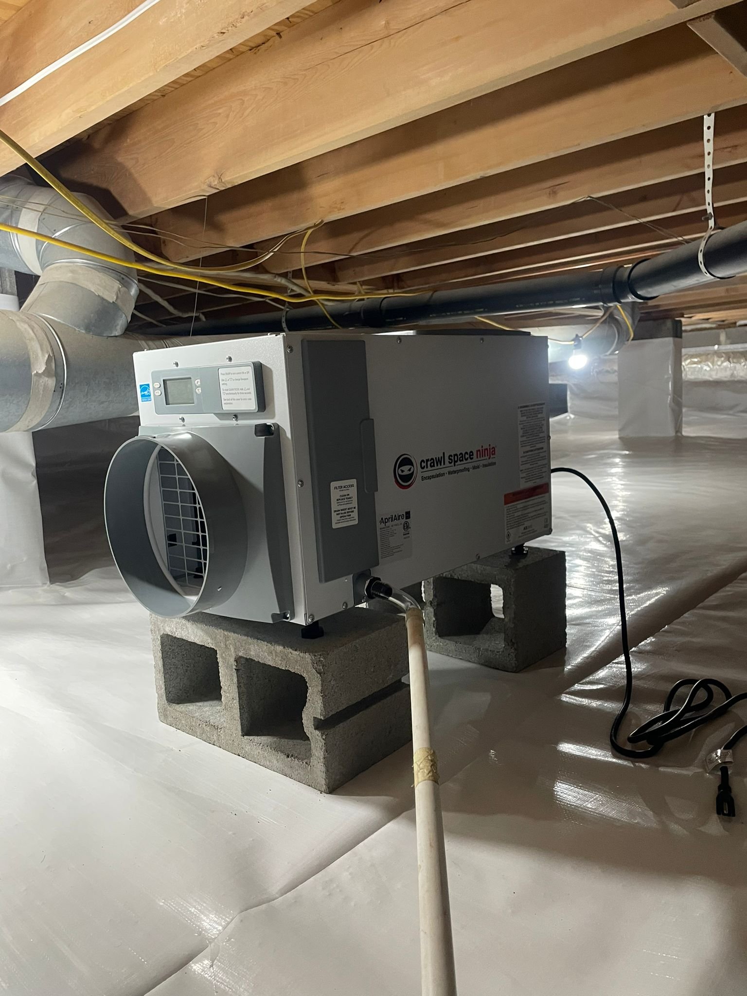 Protective sealant application on walls: Crawlspaces and Waterproofing of Cumming