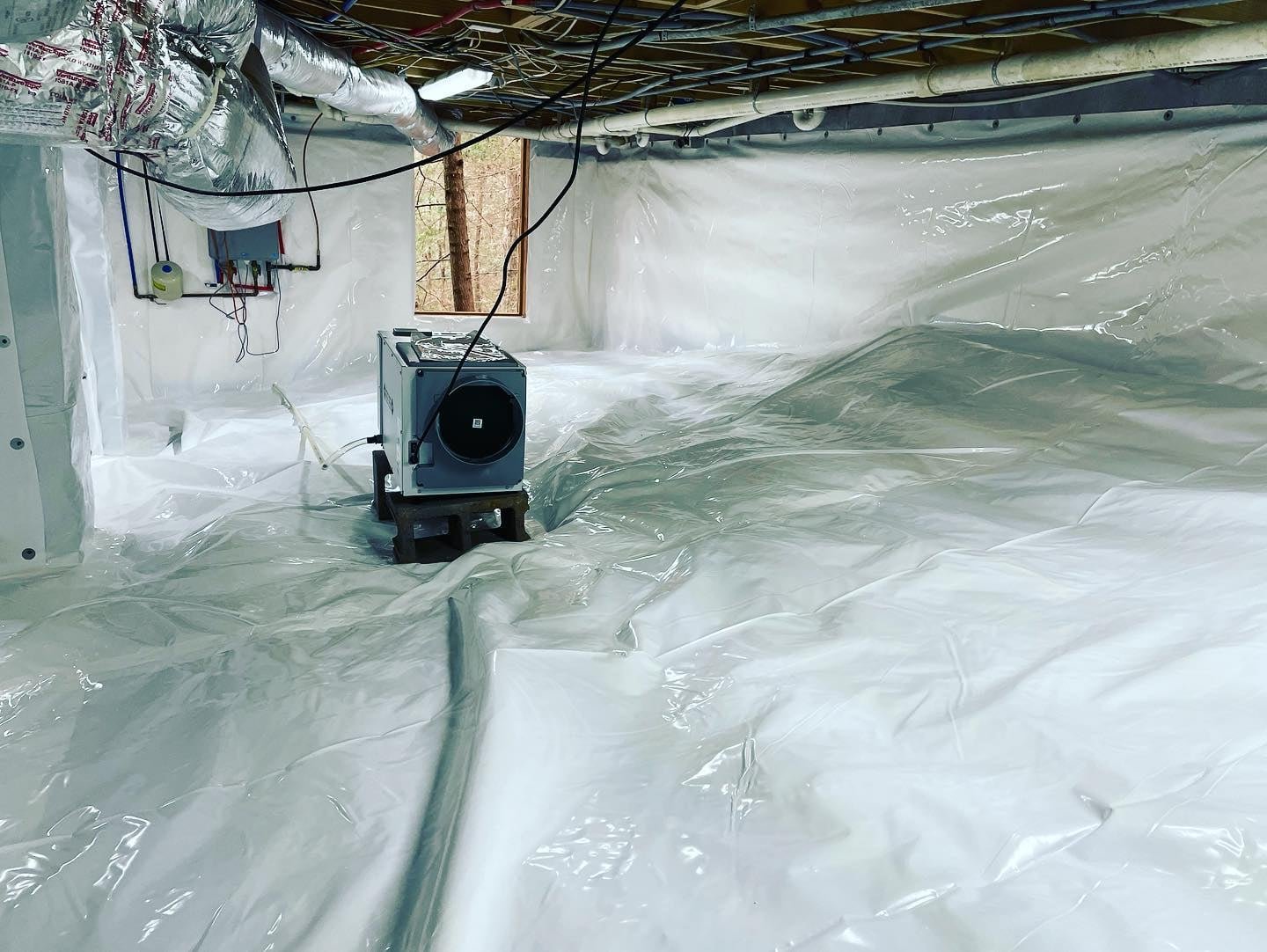 Crawl space encapsulation in Buford GA with insulation and vapor barrier